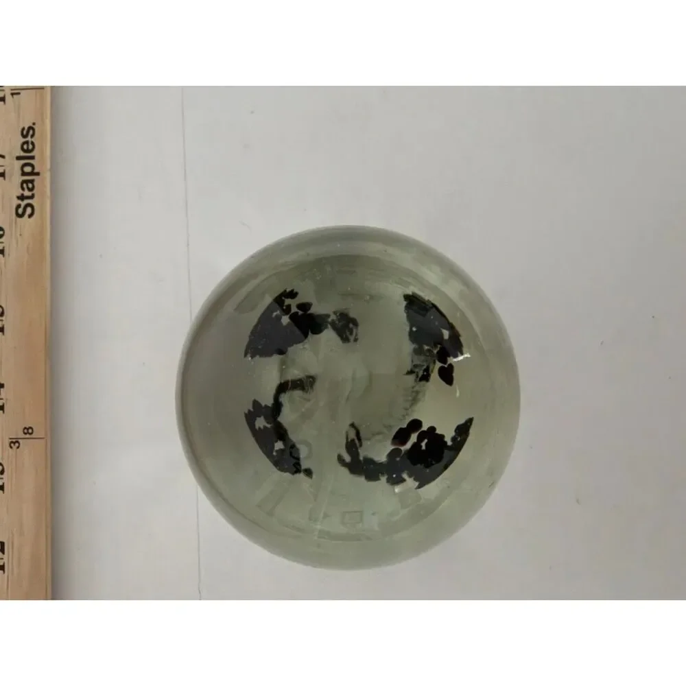 Vintage art glass paperweight with black Inclusions